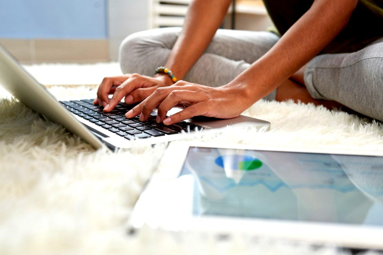 Student working on 3D game level design remotely